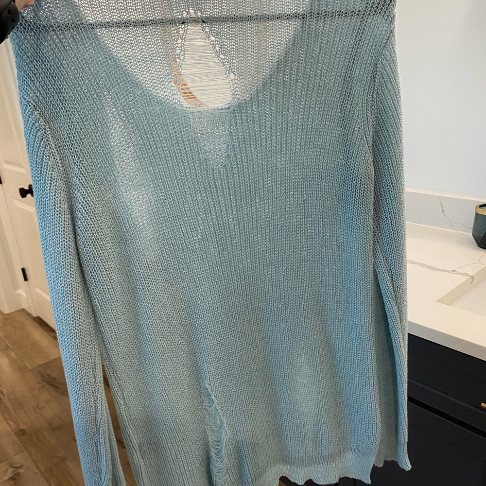 NWOT distressed baby blue sweater